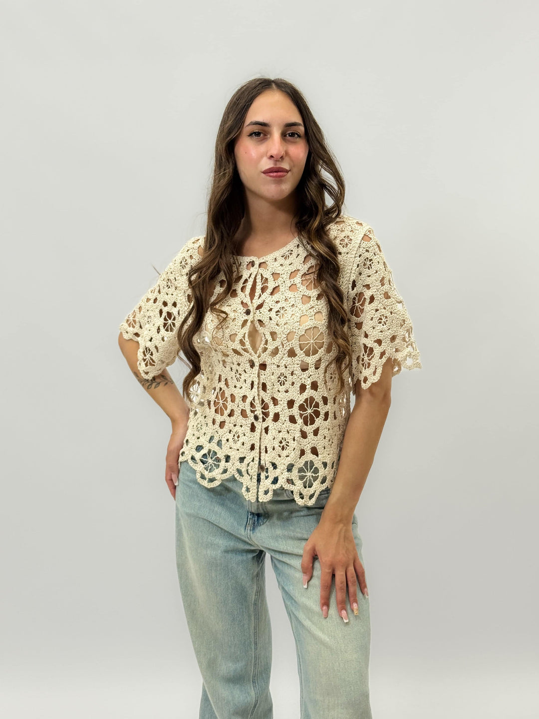 Ilse™ crochet cardigan by Emma & Rose Cape Town, showcasing a soft, textured knit with long sleeves and an open front design.