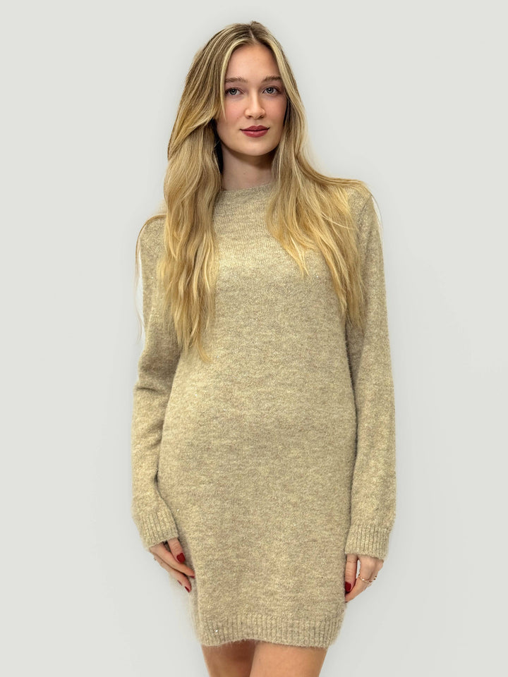Rina™ soft knit long dress by Emma & Rose Cape Town, showcasing a flowy, cozy, full-length knit dress in a natural pose.