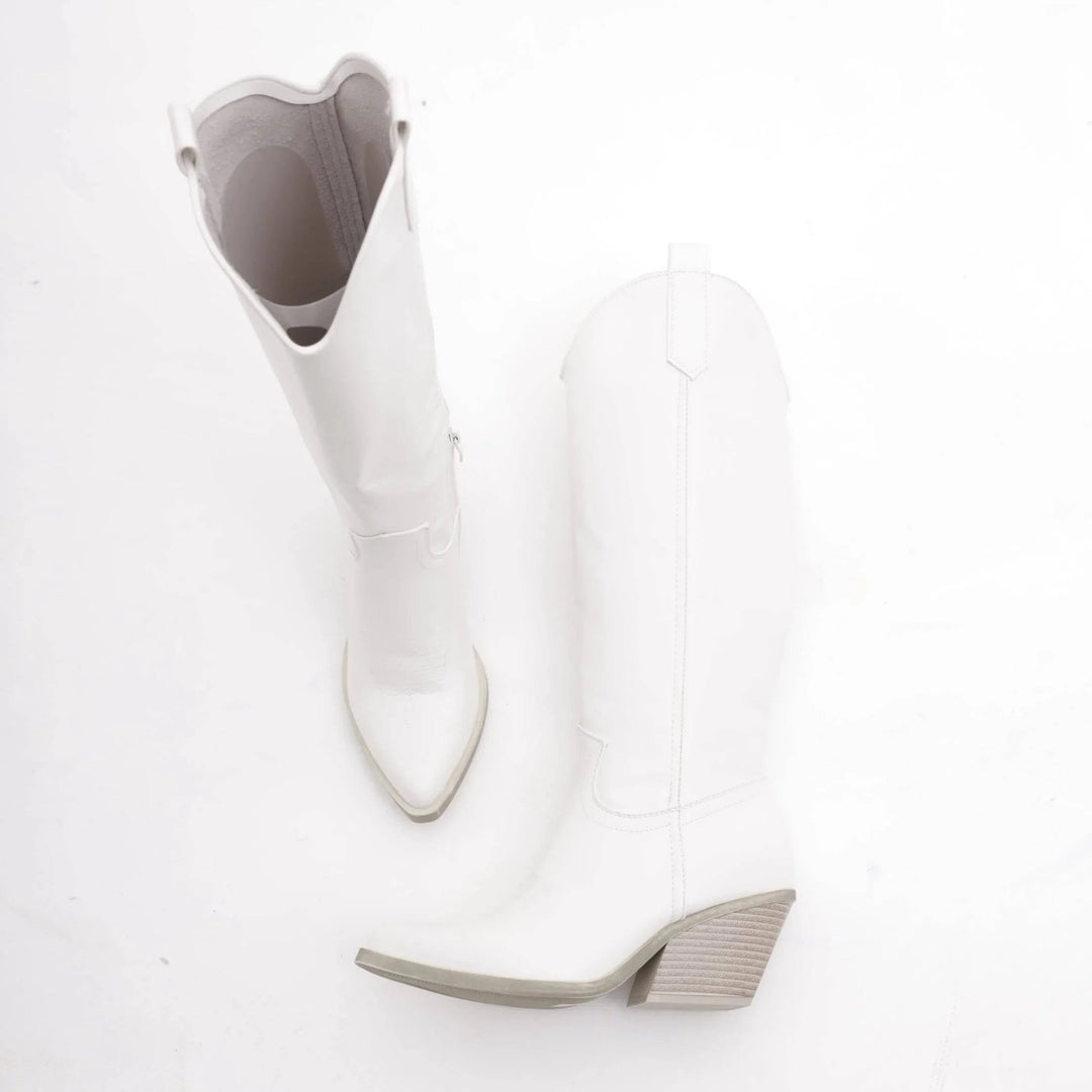 White Adele™ wide-heeled cowboy boots by Emma & Rose Cape Town featuring a stylish western design and sturdy wide heels.