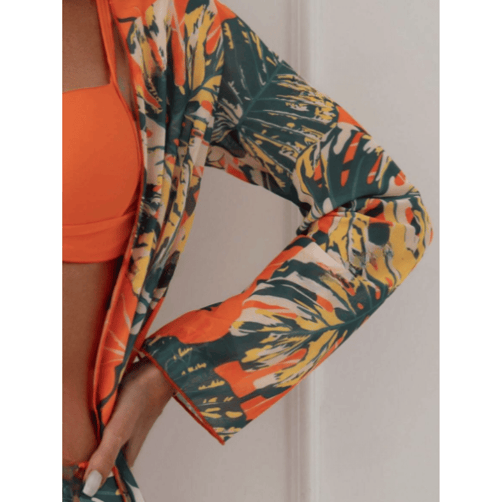 Emma & Rose Manhattan Sunset Bliss 3-piece bikini set featuring vibrant sunset-colored tops and matching bikini bottoms.