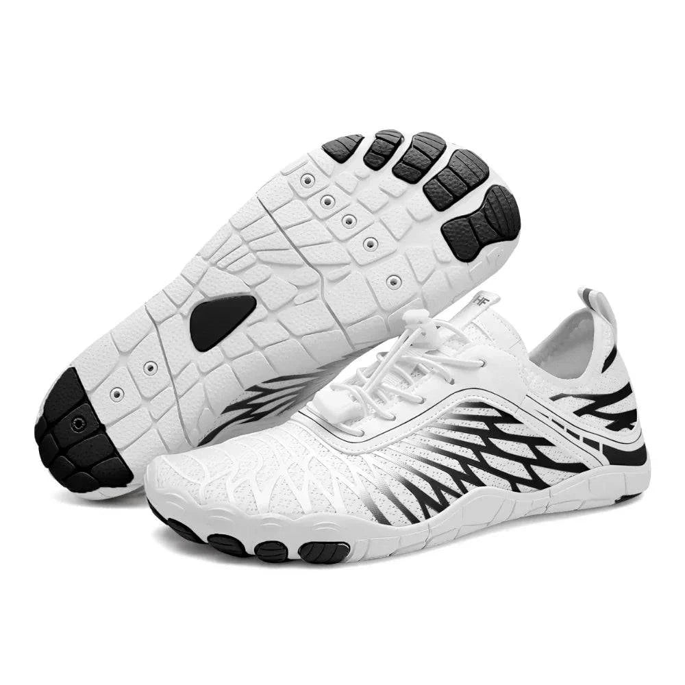 Lorax summer barefoot shoes by Emma & Rose Cape Town in white and black with non-slip soles for comfortable barefoot walking.