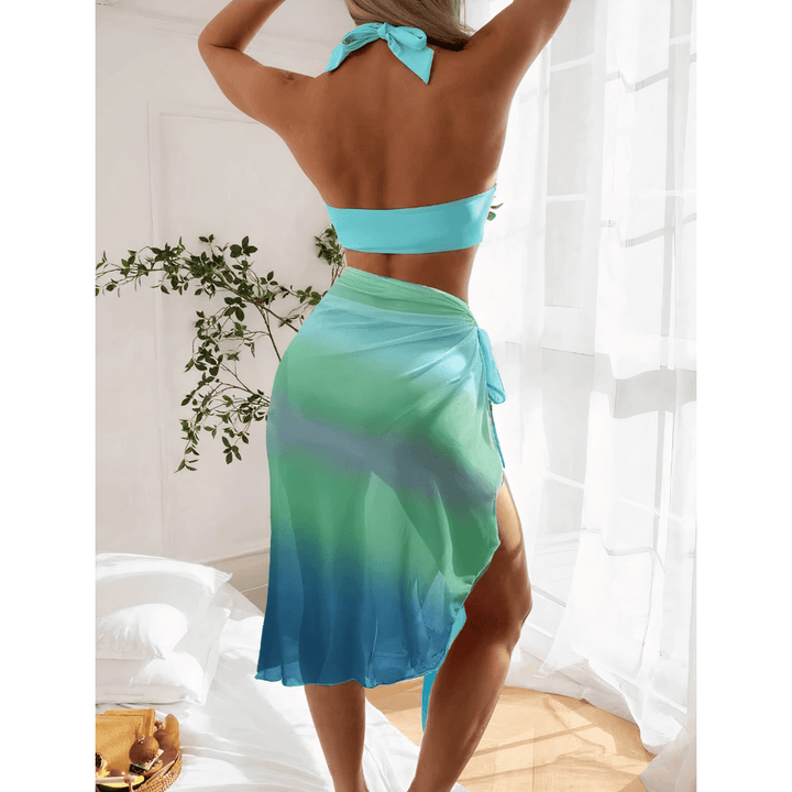 Emma & Rose Manhattan Saskia™ Beachpassion 3-in-1 bikini set with vibrant prints and adjustable straps, perfect for versatile beachwear.