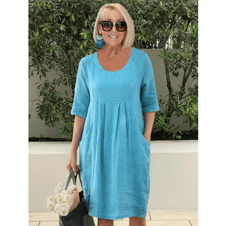Emma & Rose Manhattan Gabriella summer dress with pockets, lightweight fabric, and a stylish design perfect for warm weather.