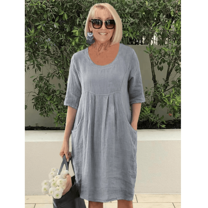 Emma & Rose Manhattan Gabriella summer dress featuring practical side pockets and a stylish, lightweight design.