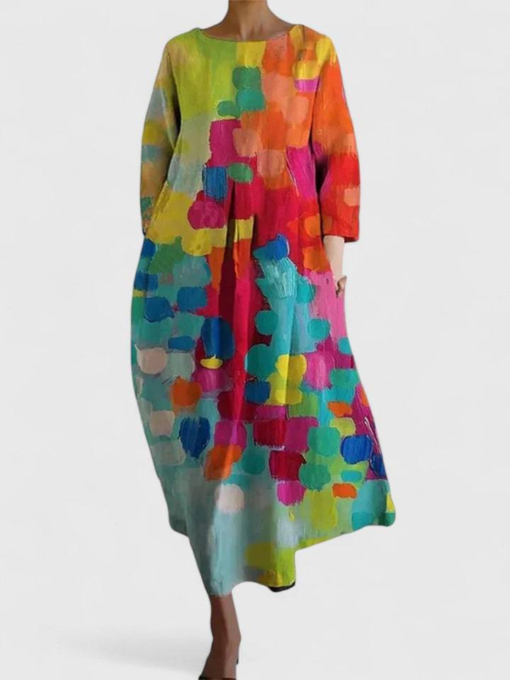 Emma & Rose Cape Town Margaritte™ stylish midi dress shown in a vibrant, flowy design with a fitted waist and elegant neckline.