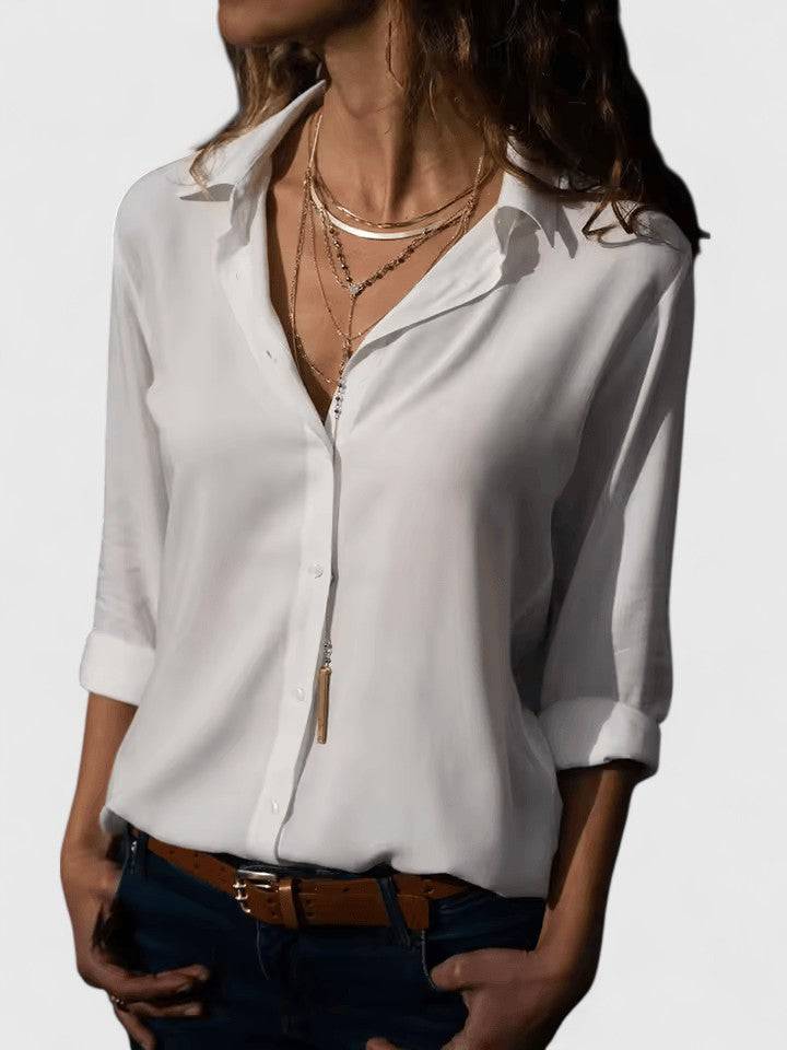 Aveline™ elegant blouse by Emma & Rose Cape Town, featuring a stylish, fitted design with detailed fabric and a sophisticated look.