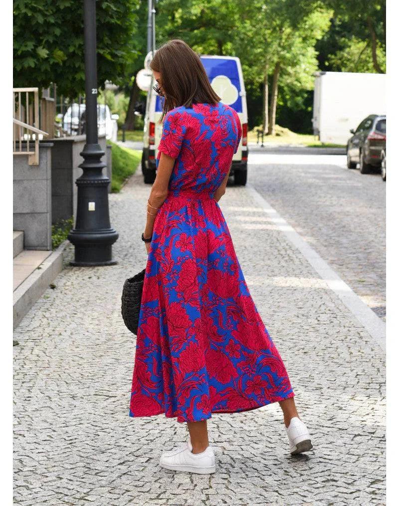 Julia™ elegant dress by Emma & Rose Manhattan, featuring a stylish design and flowing fabric, perfect for sophisticated occasions.