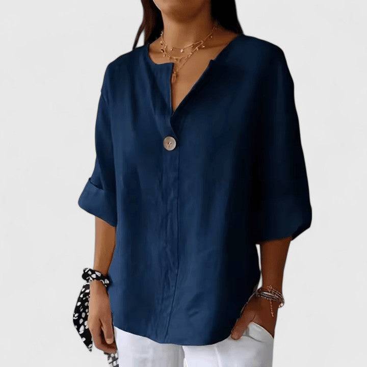 Elegant Kianna™ blouse by Emma & Rose Cape Town, featuring a stylish, flowing design with detailed fabric texture.