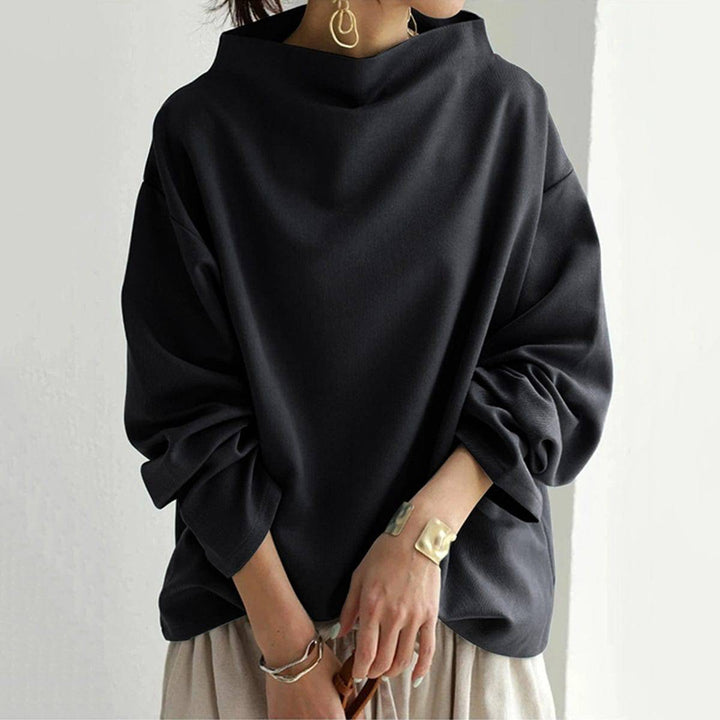 Renli™ sophisticated top by Emma & Rose Cape Town, featuring elegant design and stylish fit, shown on a model.
