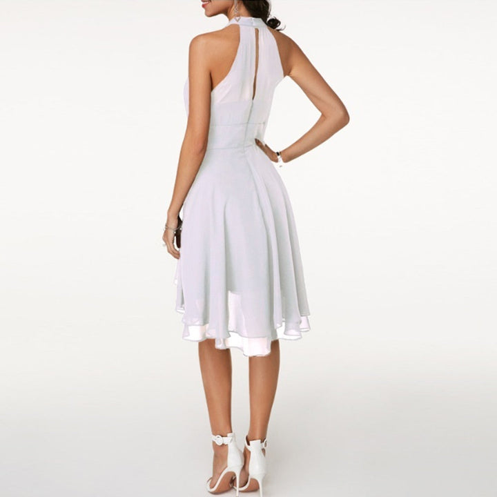 Emma | Elegant short dress for women with halter neck and flowing fall