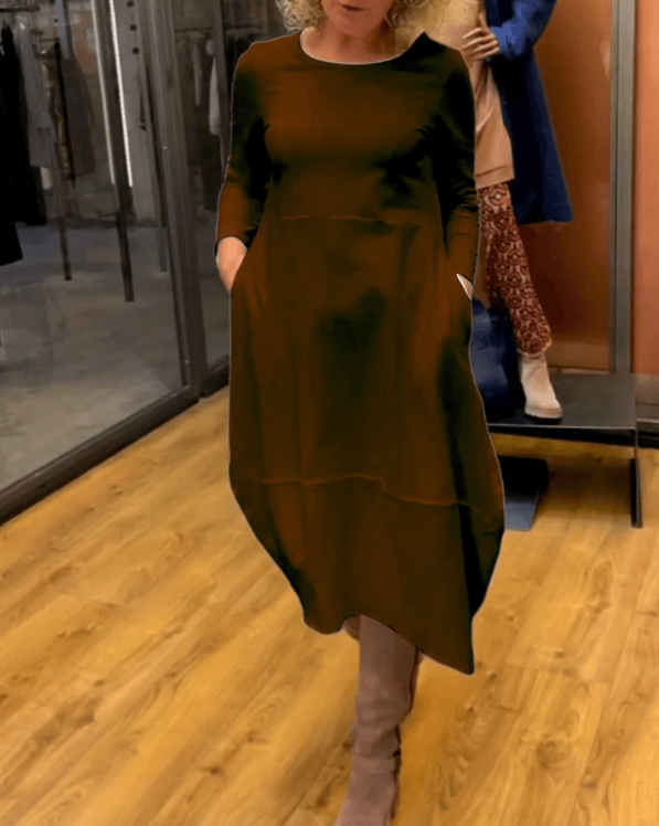 Black Clara™ midi dress by Emma & Rose Manhattan with pockets, featuring a stylish and comfortable design for everyday wear.