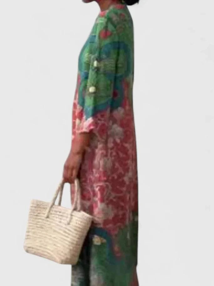 Kymberah™ Emma & Rose Cape Town sophisticated midi dress in elegant fabric, displayed on a hanger with a neutral background.