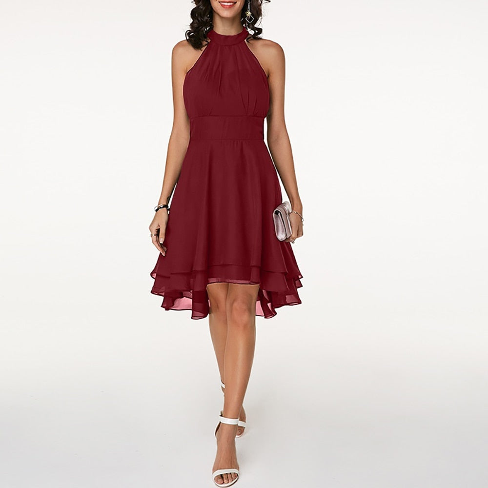Emma | Elegant short dress for women with halter neck and flowing fall
