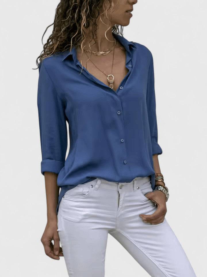 Elegant Aveline™ blouse by Emma & Rose Cape Town featuring a stylish, feminine design with intricate details and soft fabric.