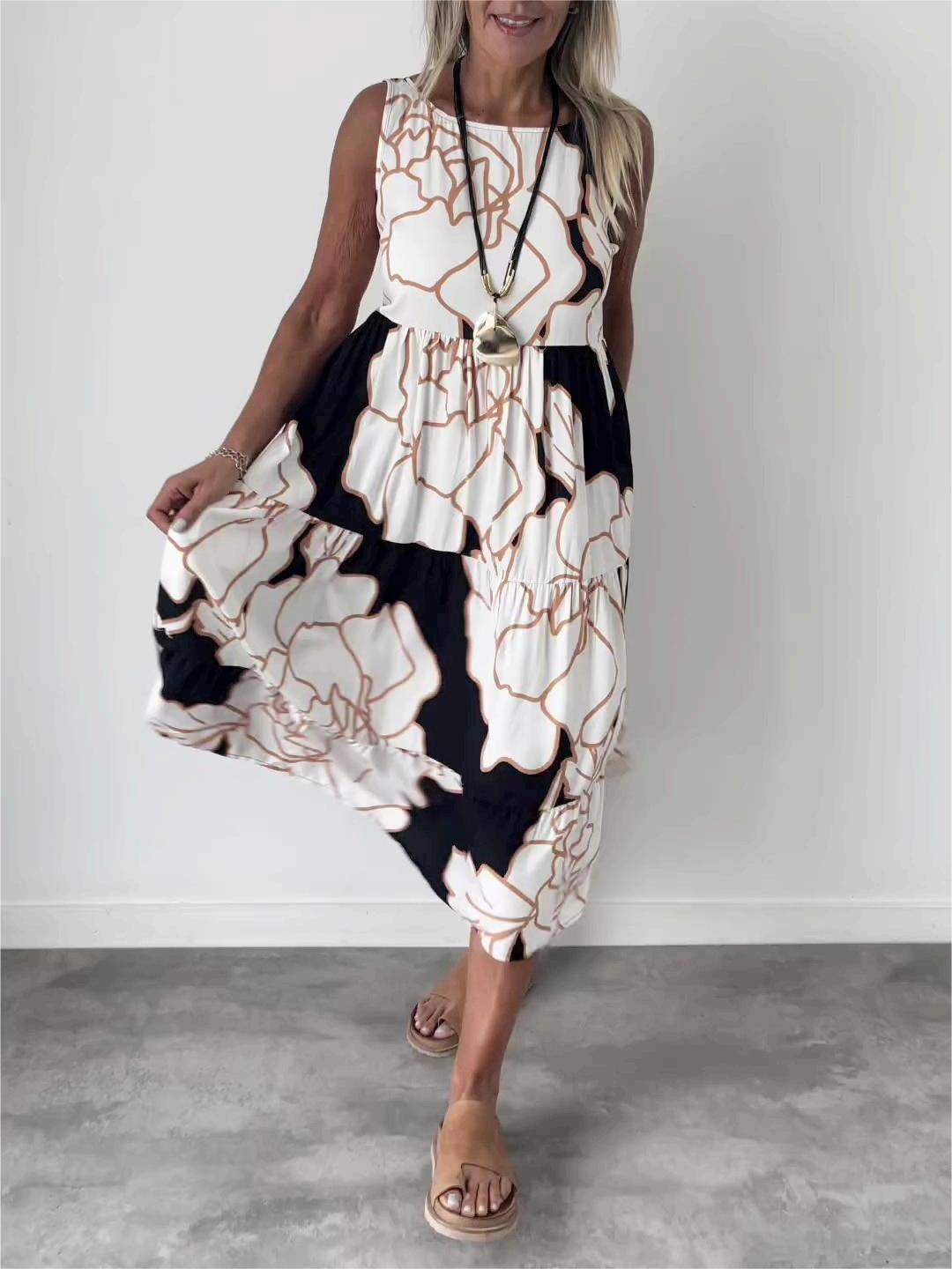 Emma & Rose Manhattan Teresa™ elegant floral print dress with fitted bodice and flowing skirt, perfect for spring and summer occasions.