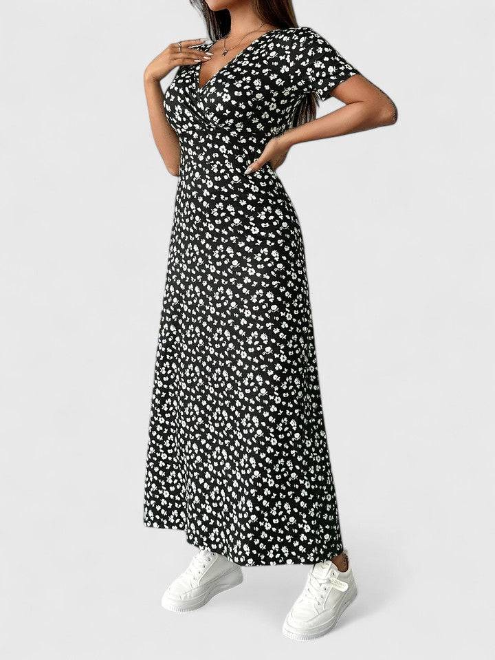 Elegant Yulivette™ maxi dress by Emma & Rose Cape Town, featuring a sophisticated flowing design and stylish neckline.