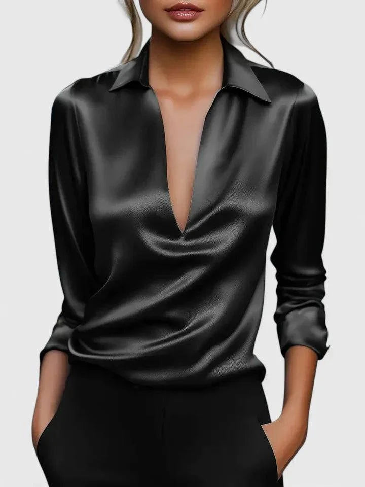 Calvina™ sophisticated blouse by Emma & Rose Cape Town, featuring elegant fabric and stylish design, shown in a close-up image.