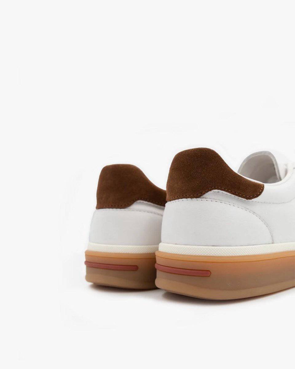 Emma & Rose Manhattan Clay casual leather sneaker featuring a sleek design, white rubber sole, and stylish leather upper.