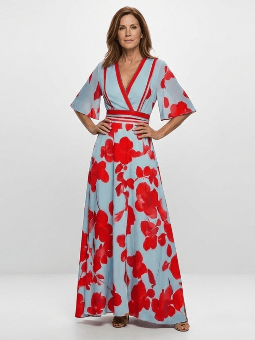 Corinne™ floral maxi dress by Emma & Rose Cape Town, featuring long sleeves and a flowing, vibrant floral pattern.
