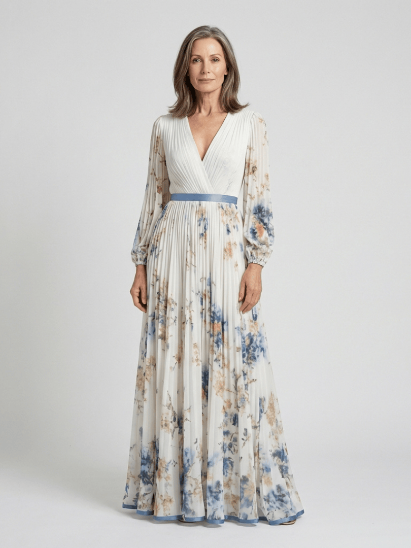 Lavinia™ floral maxi dress by Emma & Rose Cape Town, featuring a flowing neck design and vibrant floral pattern.