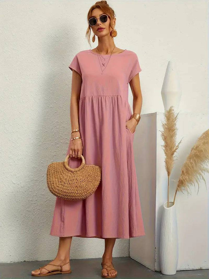 Emma & Rose Manhattan Elisa™ dress pocket shown on a stylish dress, featuring a sleek design and functional pocket detail.