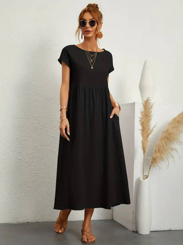 Emma & Rose Manhattan Elisa™ dress pocket with detailed stitching on soft fabric, showcasing elegant garment craftsmanship.