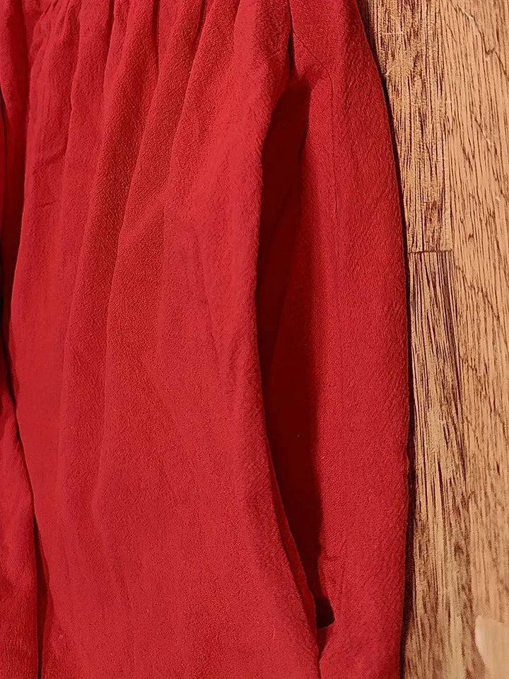 Emma & Rose Manhattan Elisa™ dress with a close-up of the fabric and a visible pocket detail in a stylish, elegant design.
