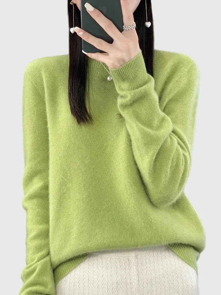 Rizalinda™ comfortable sweater by Emma & Rose Cape Town, soft knit fabric in a relaxed fit, displayed on a hanger.