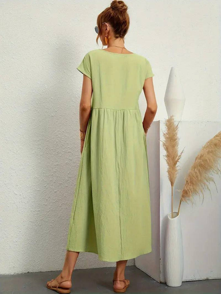Emma & Rose Manhattan Elisa™ dress with a close-up of the dress pocket showing detailed fabric and stitching.