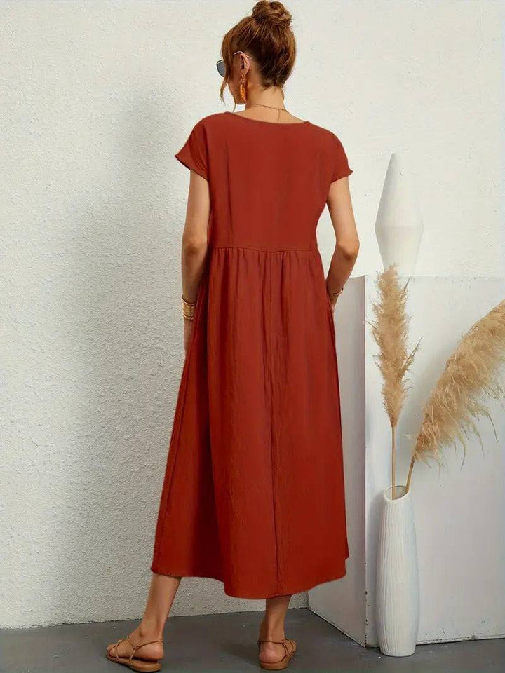 Emma & Rose Manhattan Elisa™ dress pocket showing a close-up of the stylish fabric and detailed stitching.