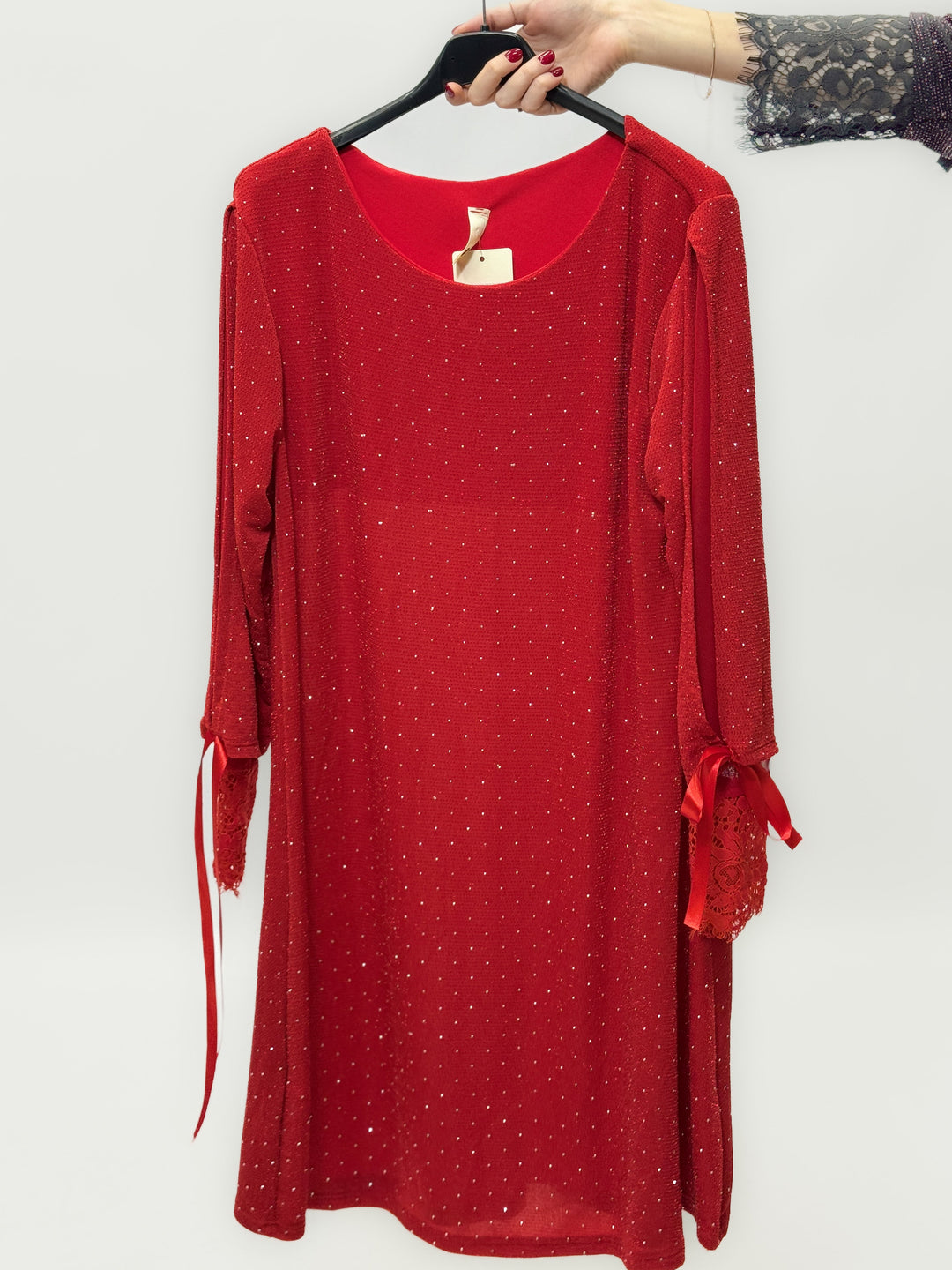 Emma & Rose Cape Town Bridget™ Brilliant Dress in black with soft luxurious fabrics and decorative bows.
