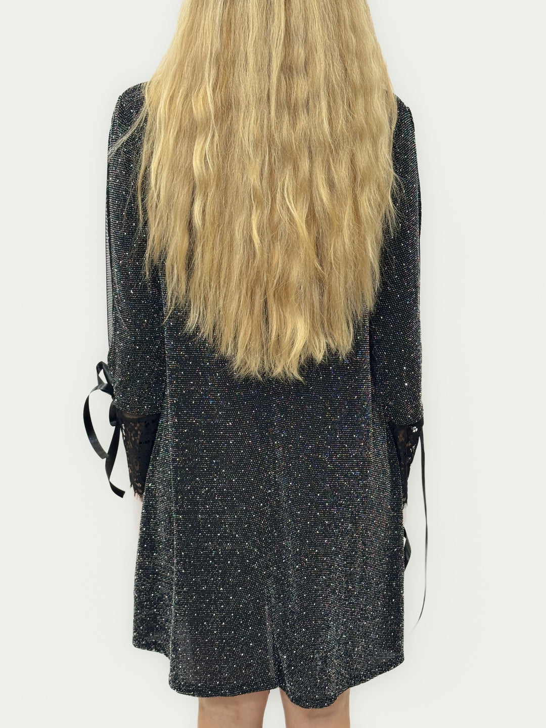 Emma & Rose Cape Town Bridget™ Brilliant Dress in black with soft luxurious fabrics and decorative bows.