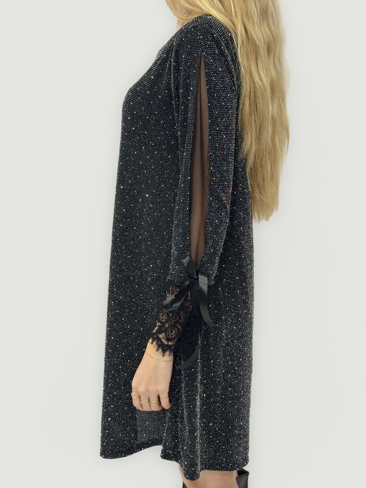 Emma & Rose Cape Town Bridget™ Brilliant dress in black with soft luxurious fabrics and bow details.