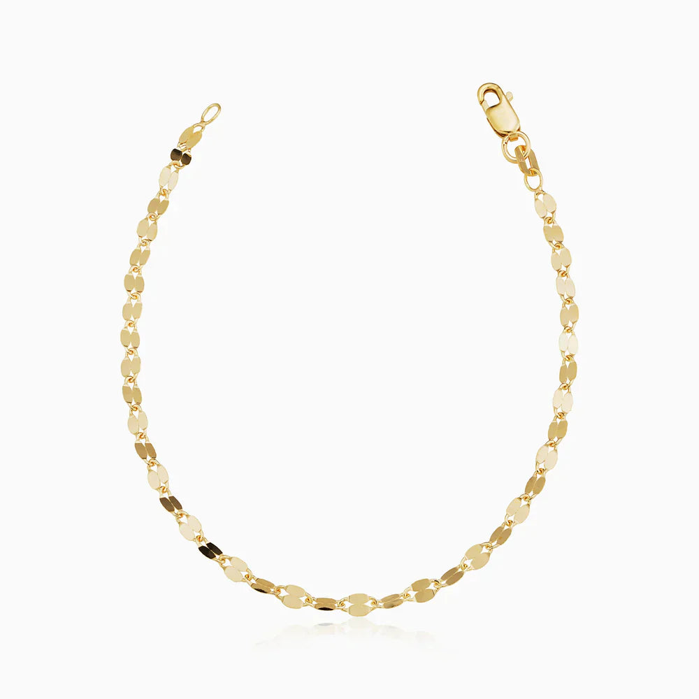 Laurizette™ 14k gold bracelet by Emma & Rose Cape Town, elegant jewelry showcasing a delicate gold chain and clasp.