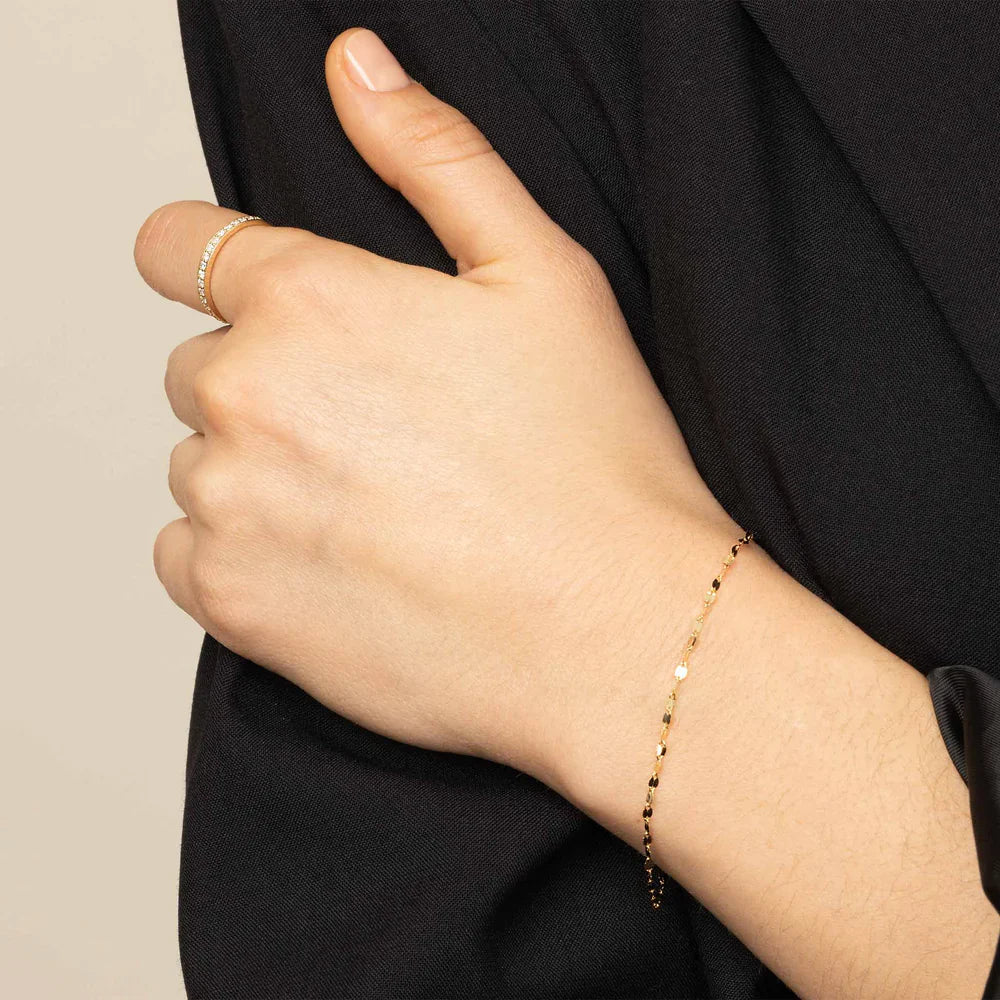 Laurizette™ 14k gold bracelet by Emma & Rose Cape Town, showcasing a delicate gold chain and elegant design.