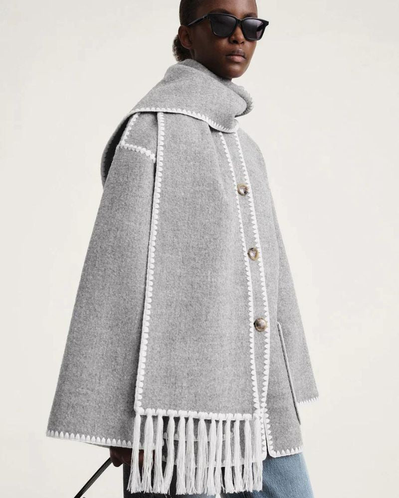 Black Jayzmarah™ stylish jacket by Emma & Rose Cape Town, shown on a model with detailed fabric and modern design.
