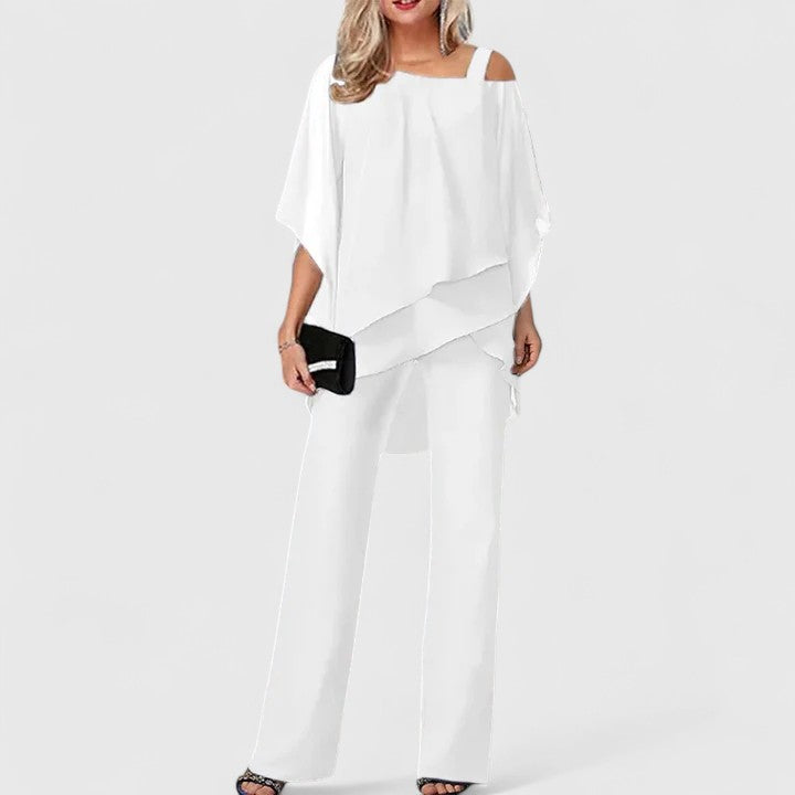 Black Serenity™ two-piece trouser set by Emma & Rose Cape Town featuring elegant tailored pants and a matching top.