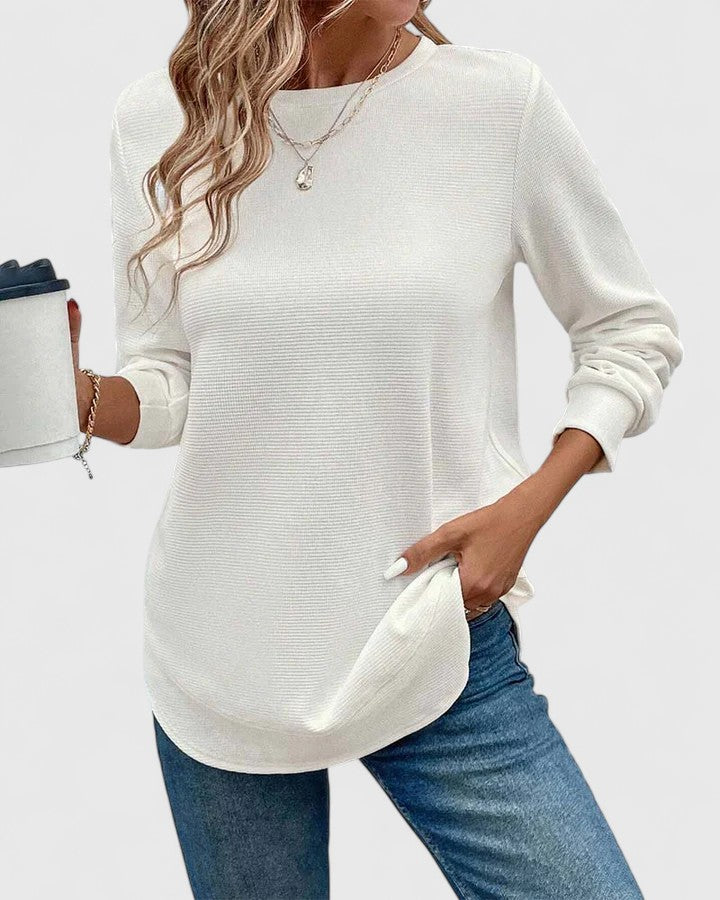 White Nadyalyn™ elegant O-neck long sleeve blouse from Emma & Rose Cape Town, featuring a sleek, fitted design with subtle detailing.