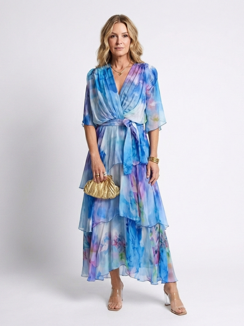 Blue Calista™ Sheer Layered V Dress by Emma & Rose Cape Town, featuring lightweight, flowing fabric and layered design