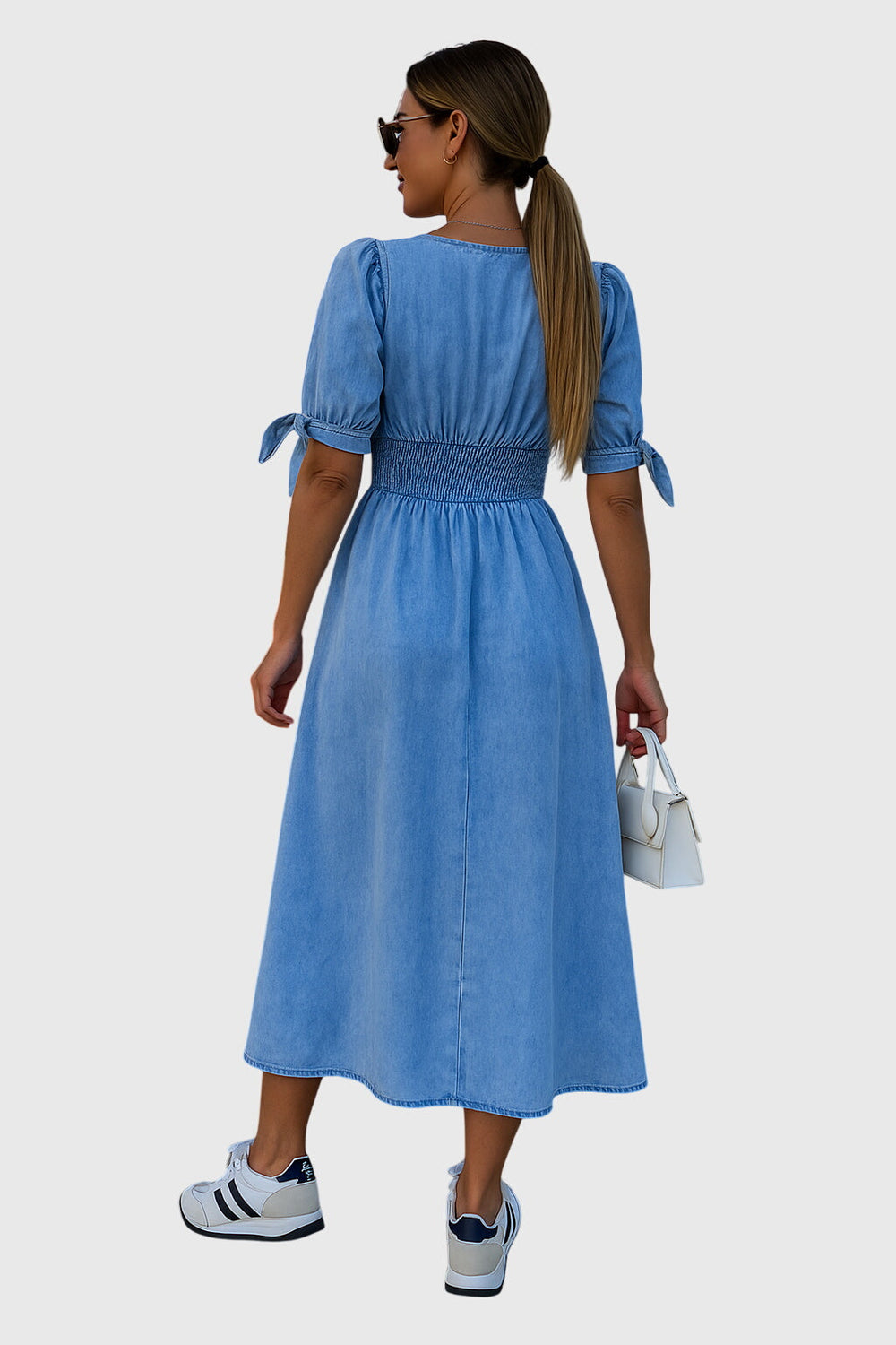 Jacqueline™ elegant dress by Emma & Rose Cape Town with soft luxurious fabrics, shown in blue fabric.