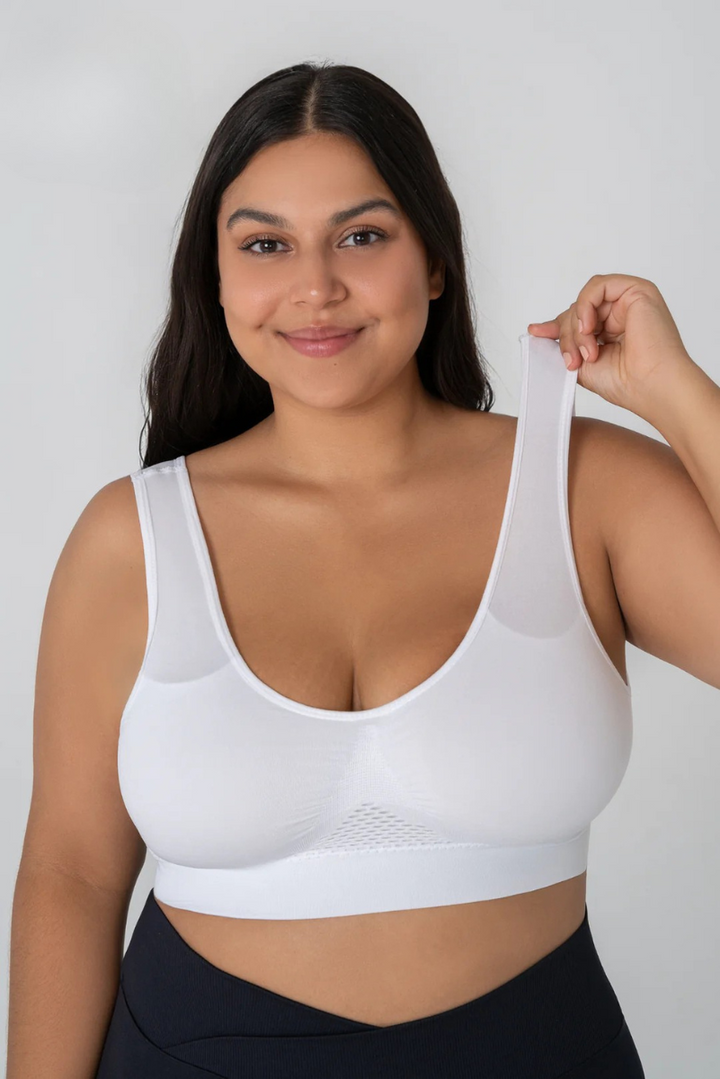 White Emma & Rose Cape Town WindLift breathable and supportive bra with adjustable straps and soft fabric for comfort.