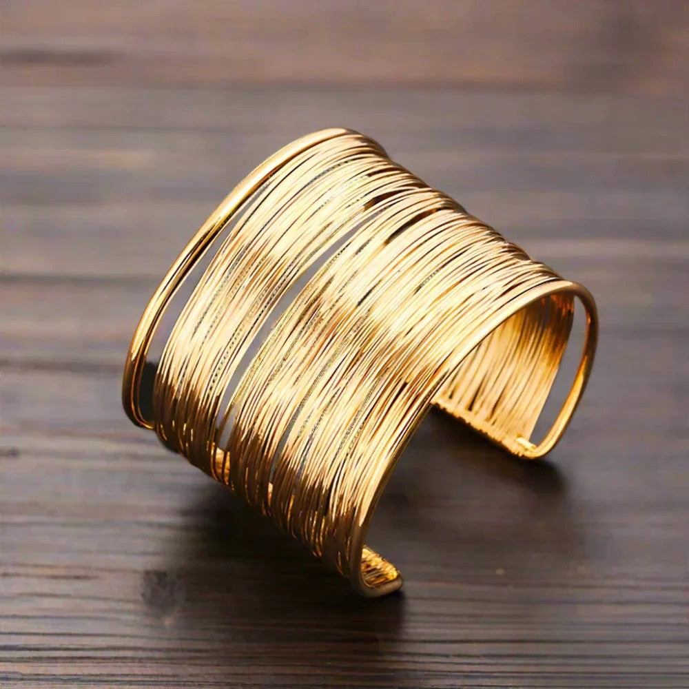 Emma & Rose Cape Town Retro™ gold bracelet with intricate design and clasp, stylish accessory for everyday wear