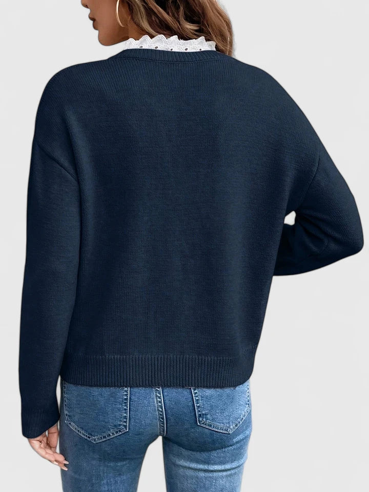 Dark blue Zaryphine™ elegant blouse by Emma & Rose Cape Town with stylish design and lightweight fabric.