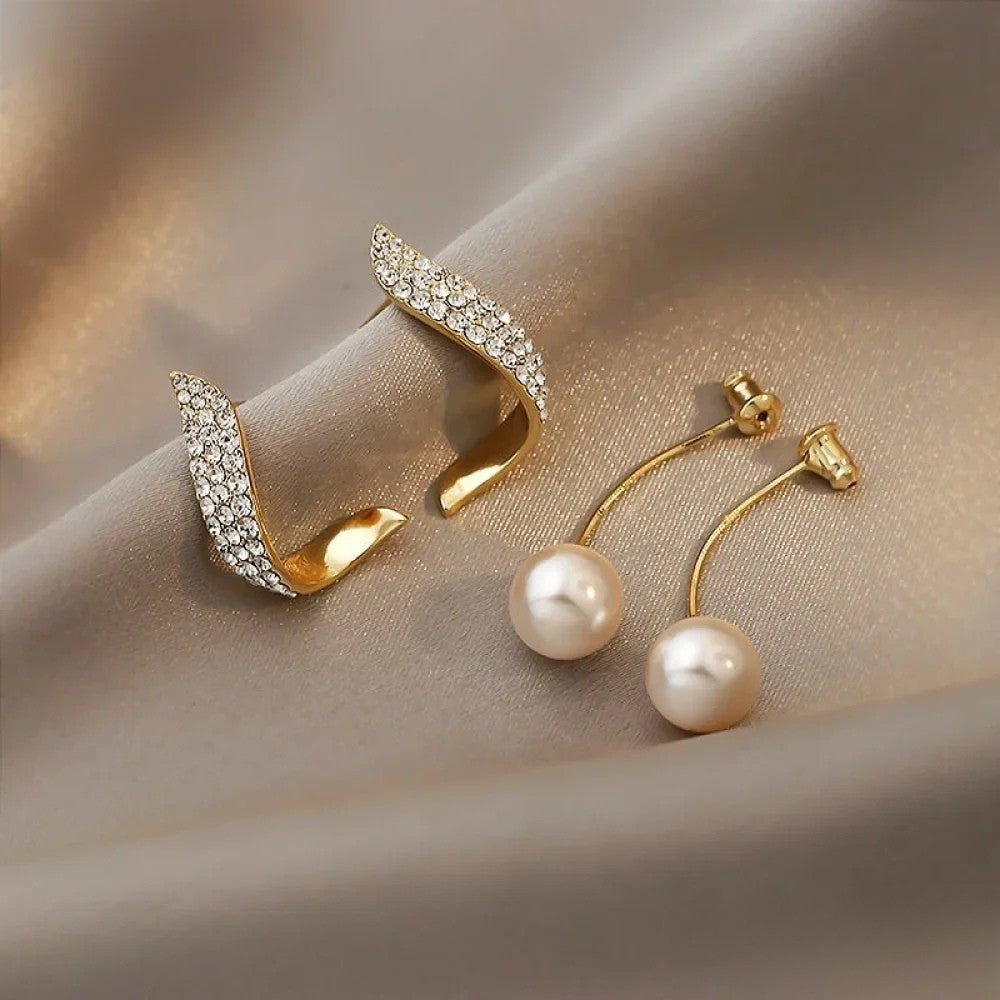 Emma & Rose Cape Town Pearl™ Delicate Earrings featuring small, elegant pearl dangle earrings on fine metal hooks.