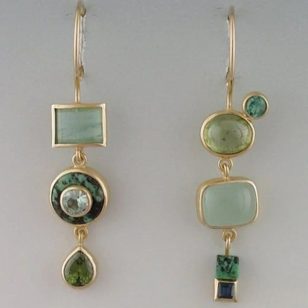 Green drop earrings by Emma & Rose Cape Town featuring retro-style earrings with elegant, vibrant green gemstone drops.