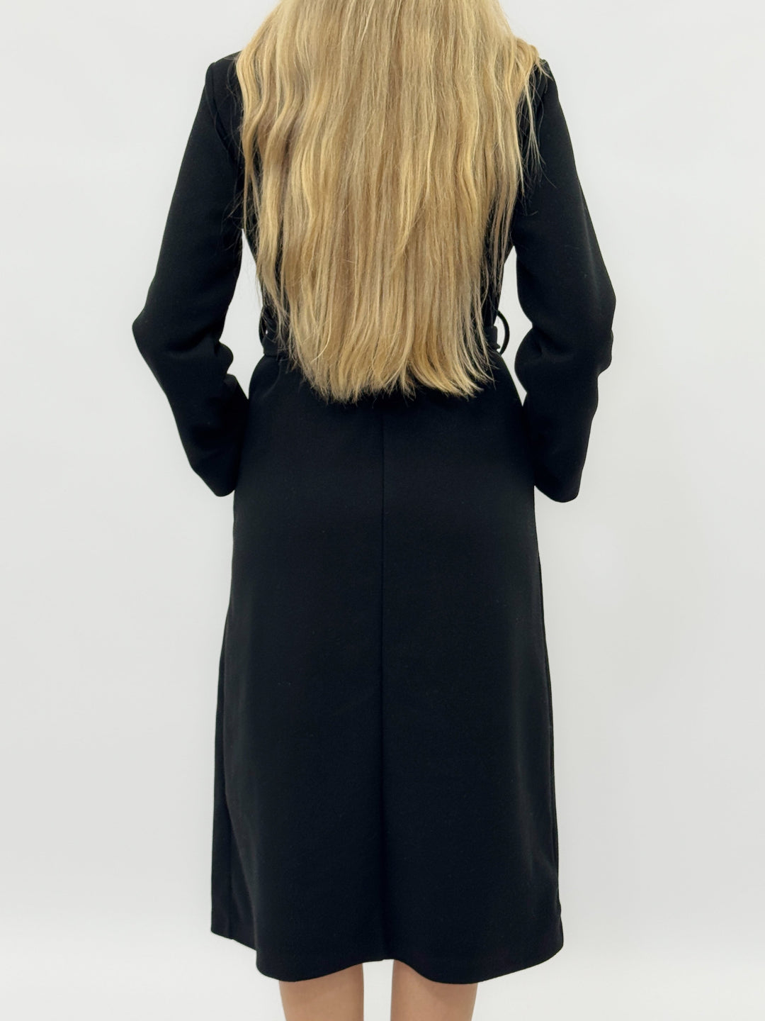 Black Fleur long coat by Emma & Rose Cape Town with belt, designed for warmth and stylish winter wear.