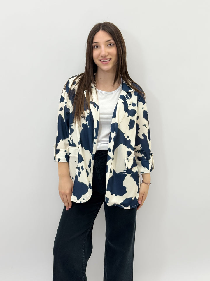 Red Moo™ print jacket by Emma & Rose Cape Town, stylish outerwear with vibrant design and comfortable fit.