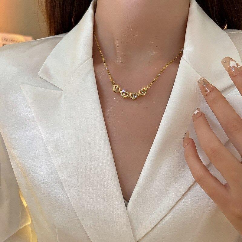 Emma & Rose Cape Town Johanna four-leaf clover necklace in gold, featuring a delicate pendant with a four-leaf clover design.