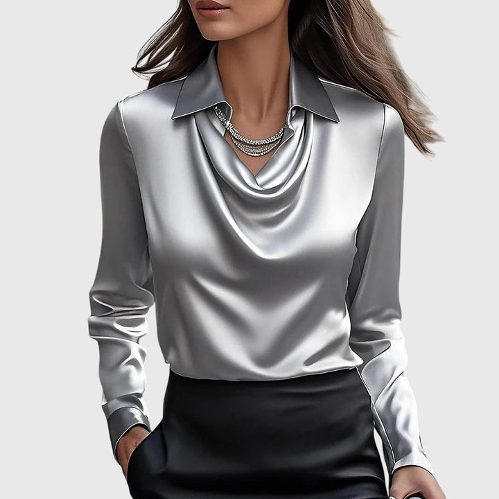 Emma & Rose Cape Town Lize Elegant Blouse in gold, XS size, featuring a stylish and sophisticated design with flowing fabric.