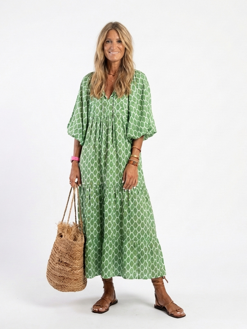 Green Apolline™ neck-patterned midi dress by Emma & Rose Cape Town, featuring a stylish design and elegant fit.